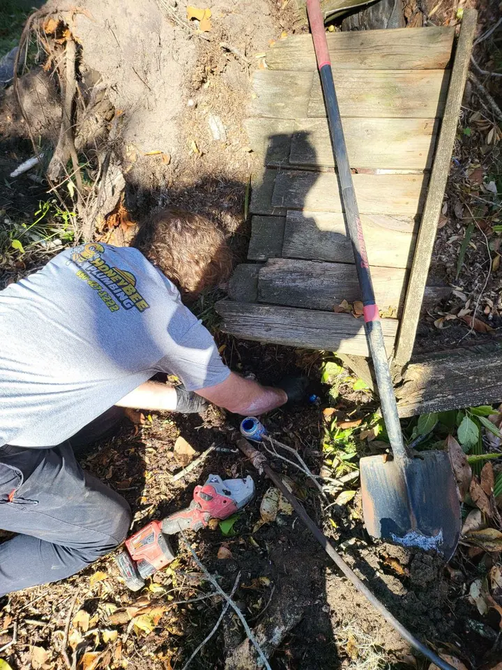 Honey Bee Plumbing reaching outdoor plumbing through storm debris