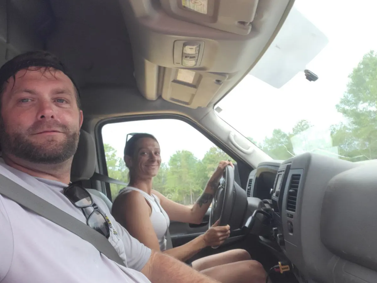 Robert and Stacy of Honey Bee Plumbing traveling to a service call