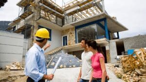 Plumber Consultation with Clients - Honey Bee Plumbing Licensed plumber discussing project details with clients