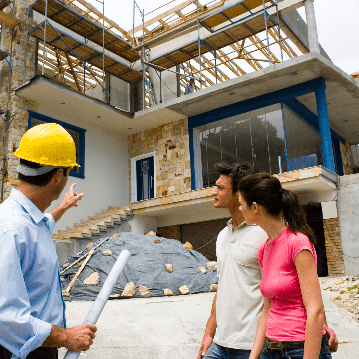 Plumber Consultation with Clients Licensed plumber discussing project details with clients